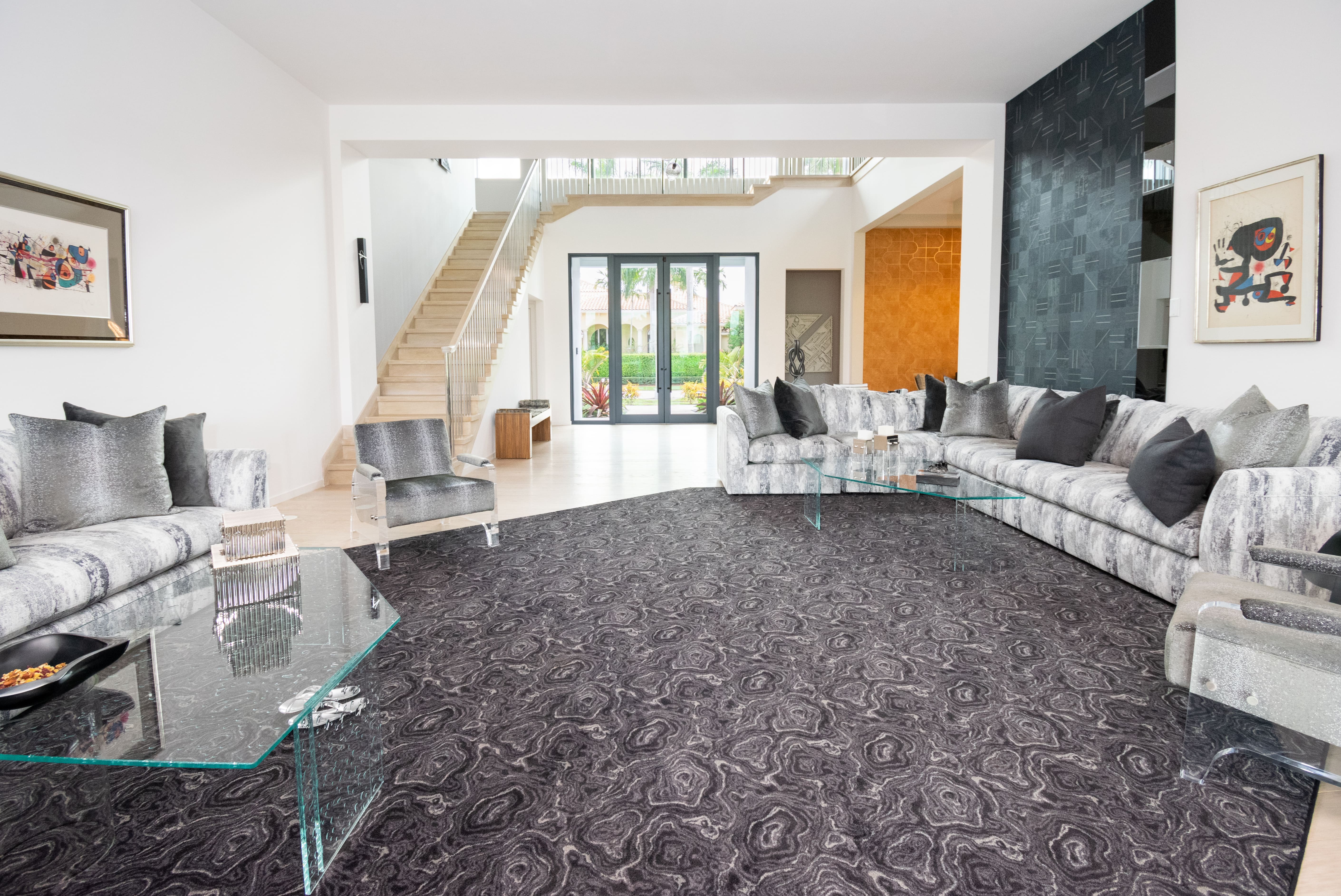 Example of luxurious handcrafted wall-to-wall inlayed carpet installation.